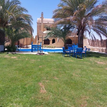 Villa 7 Al Fayyūm Exteriör bild